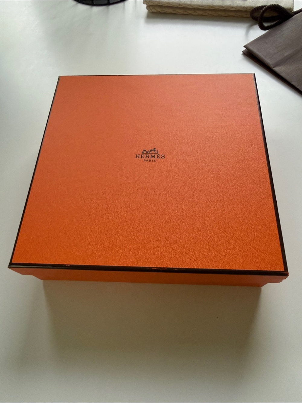 Hermes Orange Box with Black Trim tissue paper and ribbon
